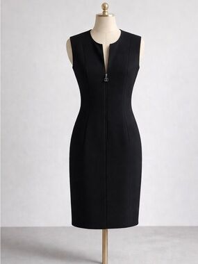 Classic Chanel wool crêpe dress with silk lining, timeless Parisian tailoring.